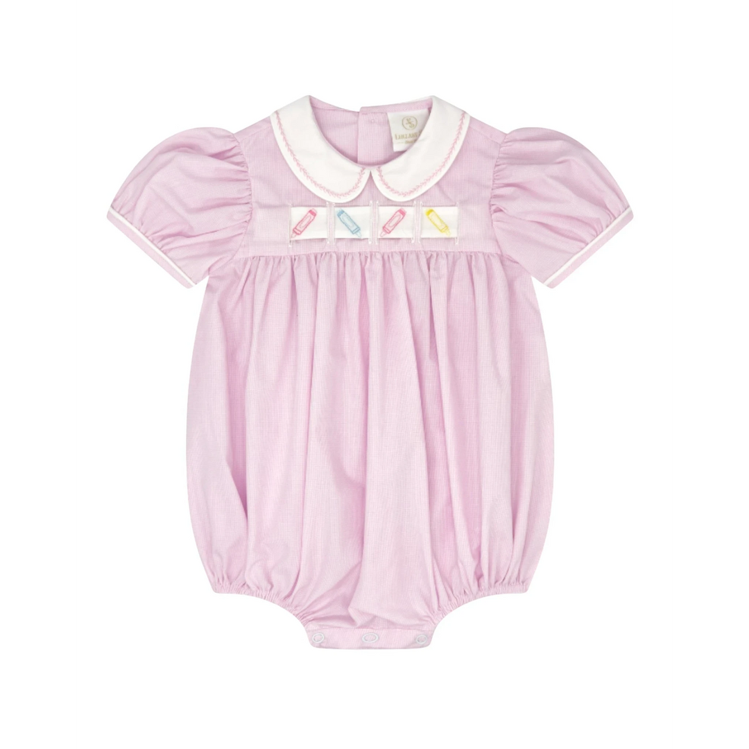 That Store pink mini gingham bubble romper with a white Peter Pan collar and interchangeable ribbon design