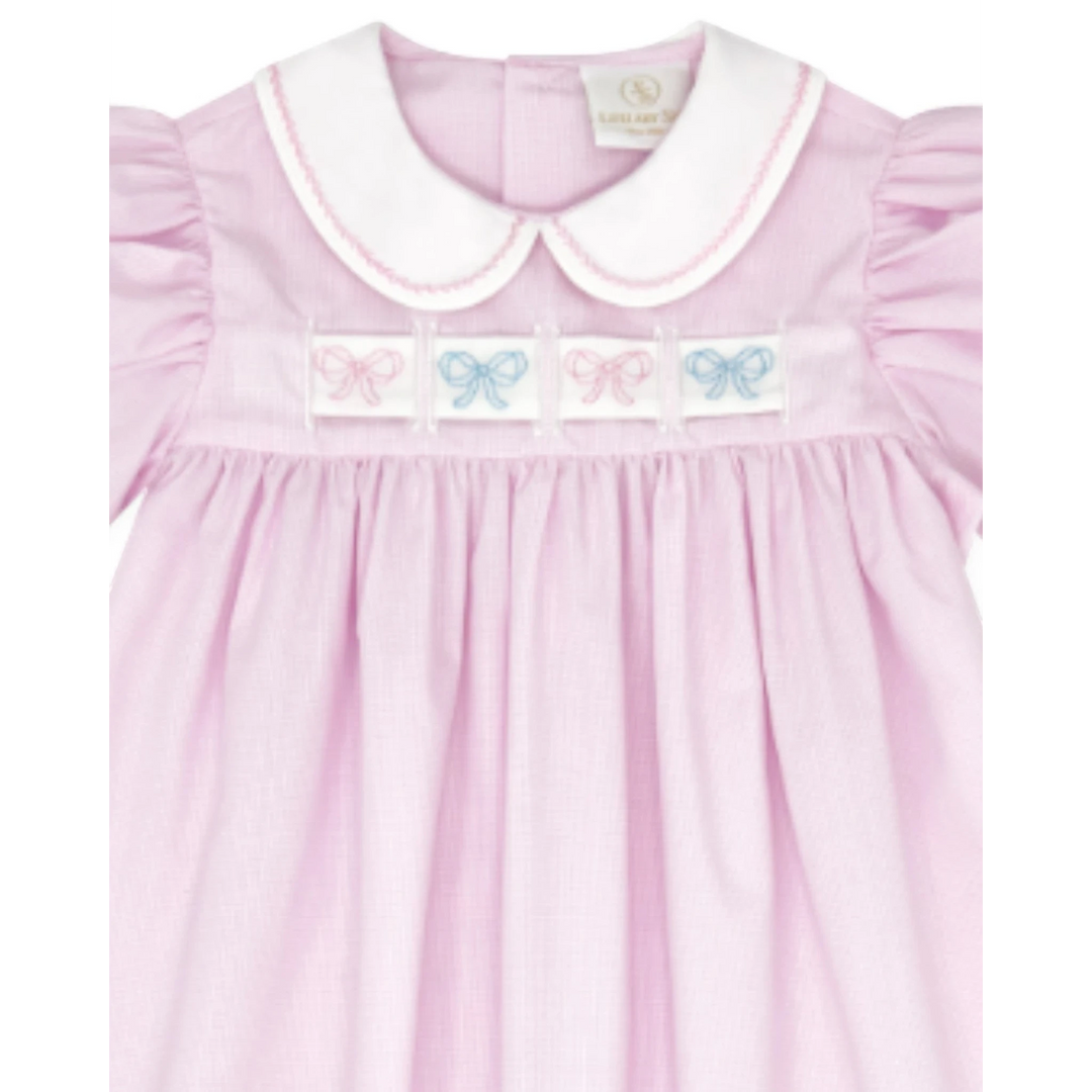 That Store Ruth Ribbon Dress in pink mini gingham with a white Peter Pan collar and interchangeable bow embroidery