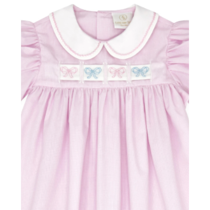 That Store Ruth Ribbon Dress in pink mini gingham with a white Peter Pan collar and interchangeable bow embroidery