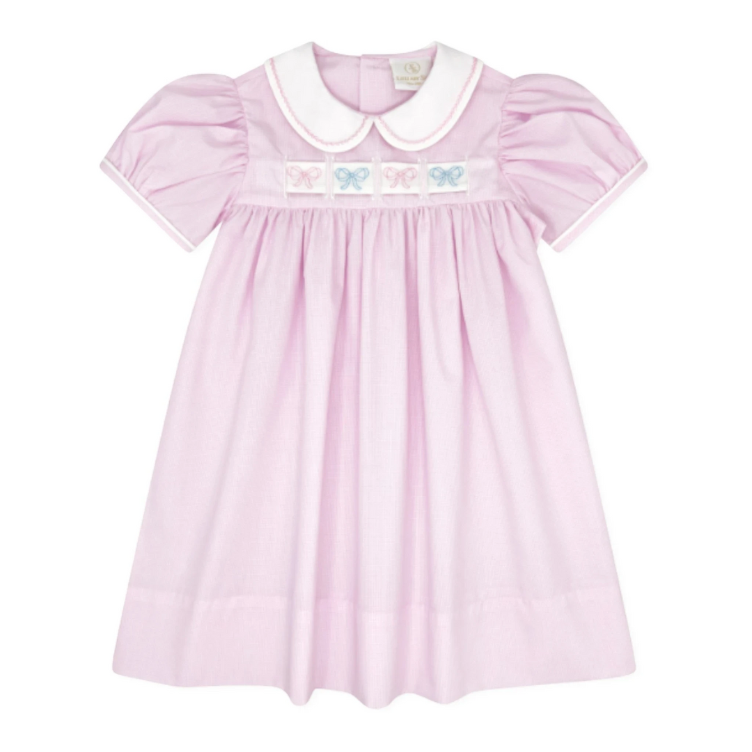 That Store pink mini gingham Ruth Ribbon Dress with white Peter Pan collar and interchangeable ribbon embroidery