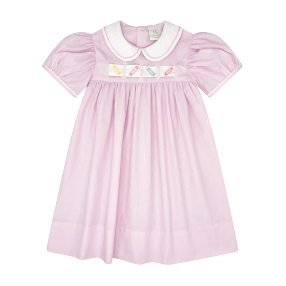 That Store pink mini gingham Ruth Ribbon dress with white Peter Pan collar and interchangeable holiday ribbons.