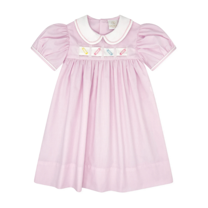 That Store pink mini gingham Ruth Ribbon dress with white Peter Pan collar and interchangeable holiday ribbons.