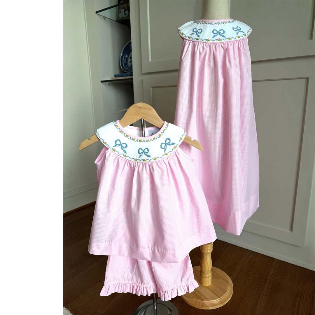 That Store pink gingham smocked yoke dress and matching set with embroidered bow details for girls