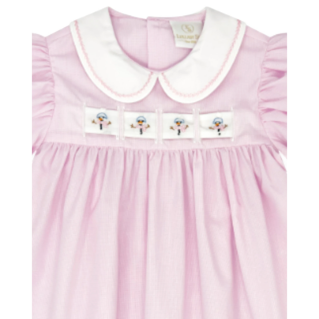 That Store Ruth Ribbon Dress in pink mini gingham with a white Peter Pan collar and interchangeable snowman ribbons