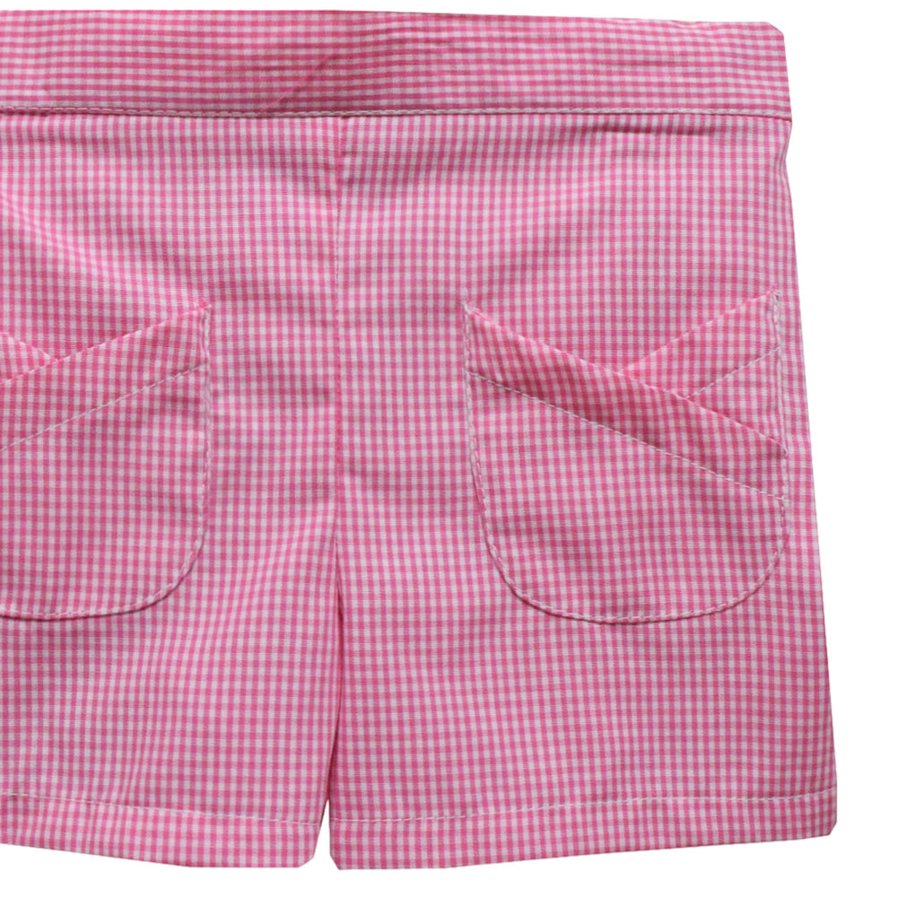 That Store candy pink gingham girls shorts with decorative tulip-shaped front pockets and elastic waistband