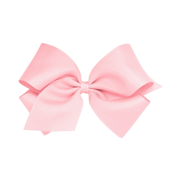 That Store light pink grosgrain hair bow with a patented no-slip alligator clip for toddlers and girls