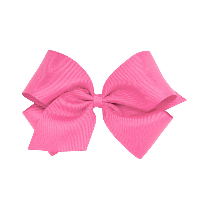 That Store bright pink grosgrain King hair bow with a secure no-slip alligator clip for toddlers and girls.
