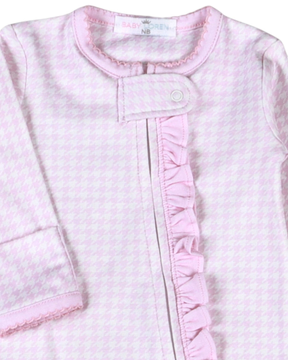 That Store pink and white houndstooth Pima cotton baby footie with a ruffled zipper front and snap closure