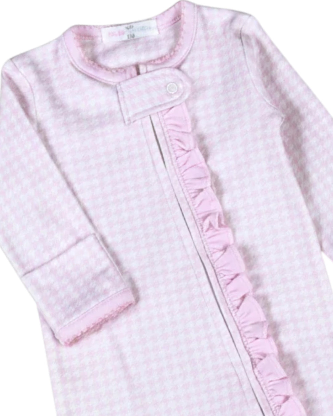 That Store pink and white houndstooth Pima cotton baby footie with a ruffled zipper front for easy dressing.