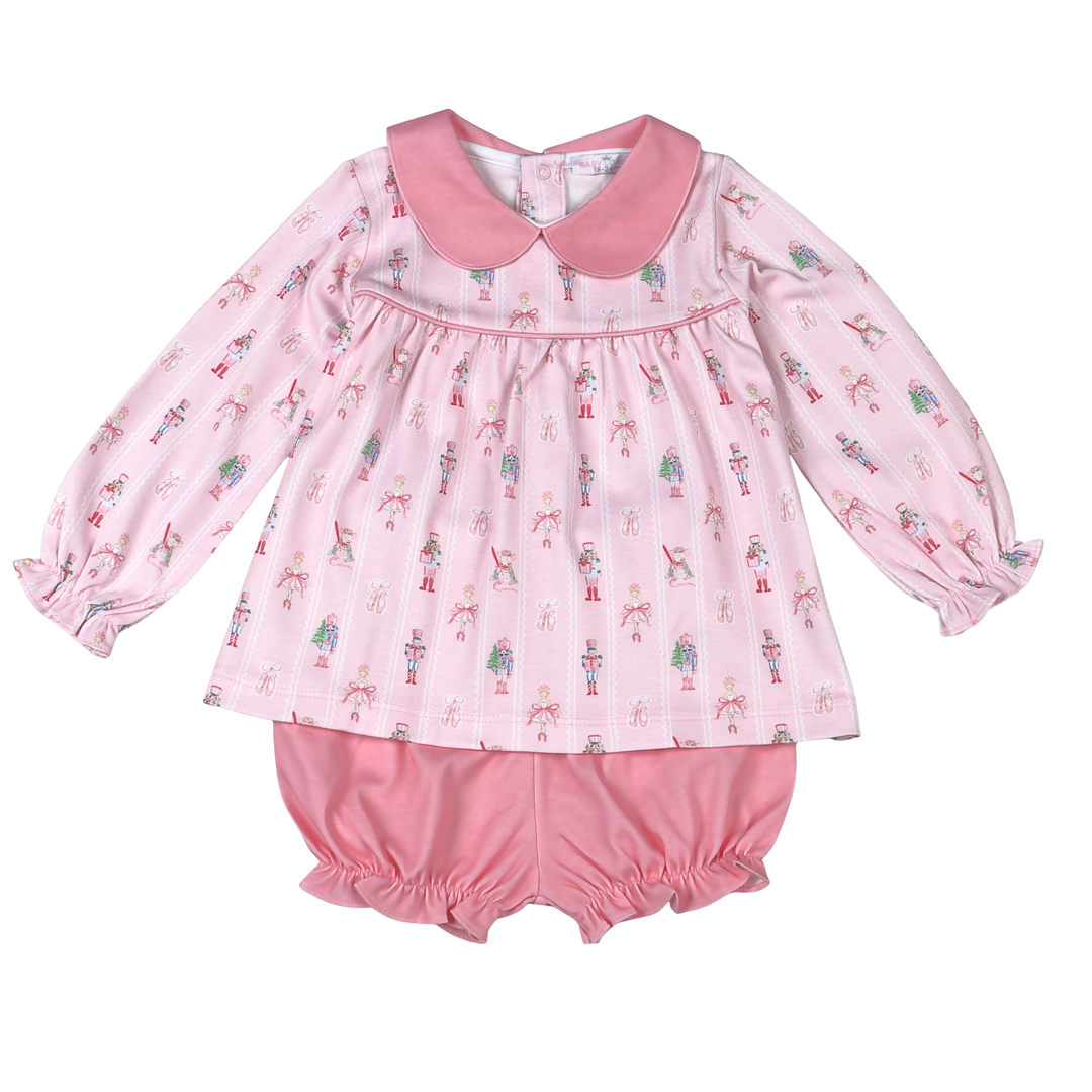 That Store pink Pima cotton bloomer set featuring a Nutcracker print, Peter Pan collar, and ruffled sleeves.