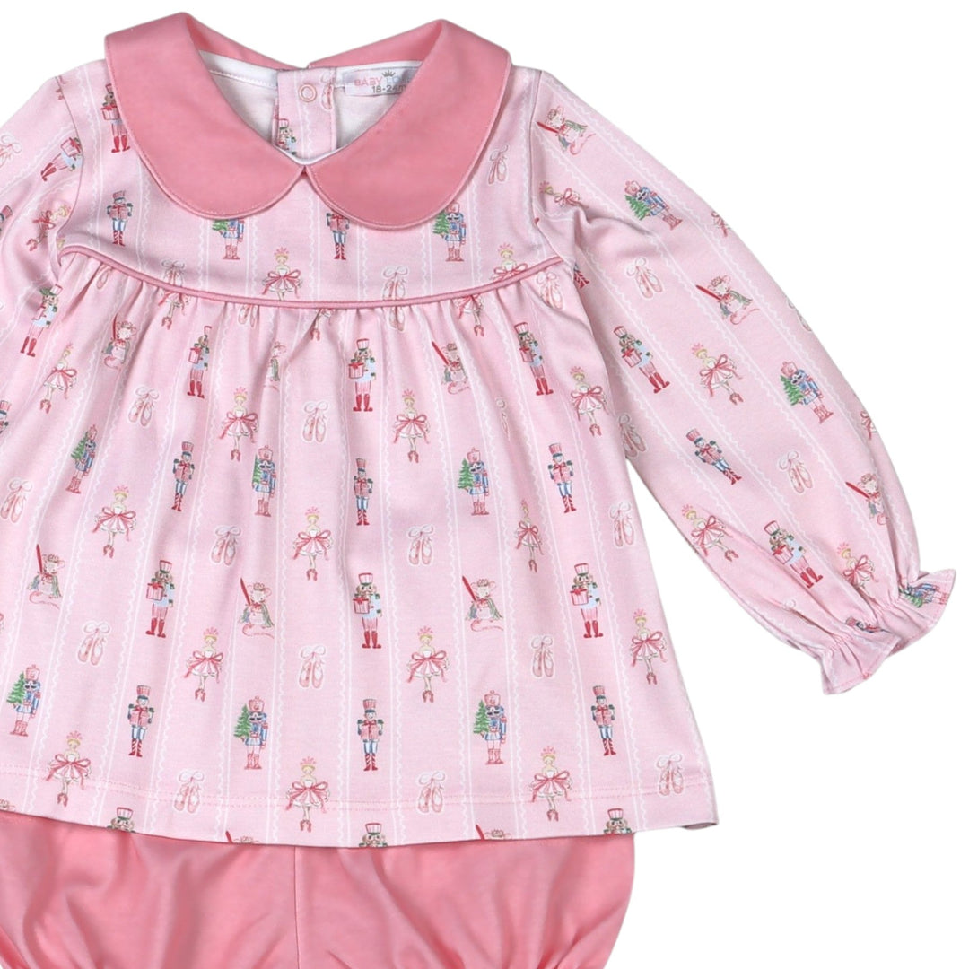 That Store pink Pima cotton bloomer set featuring a Nutcracker print, peter pan collar, and long sleeves.