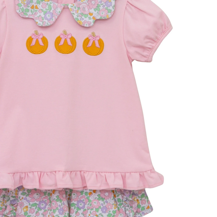 That Store girls pink cotton short set featuring pumpkin appliques and a floral Peter Pan collar and matching shorts.