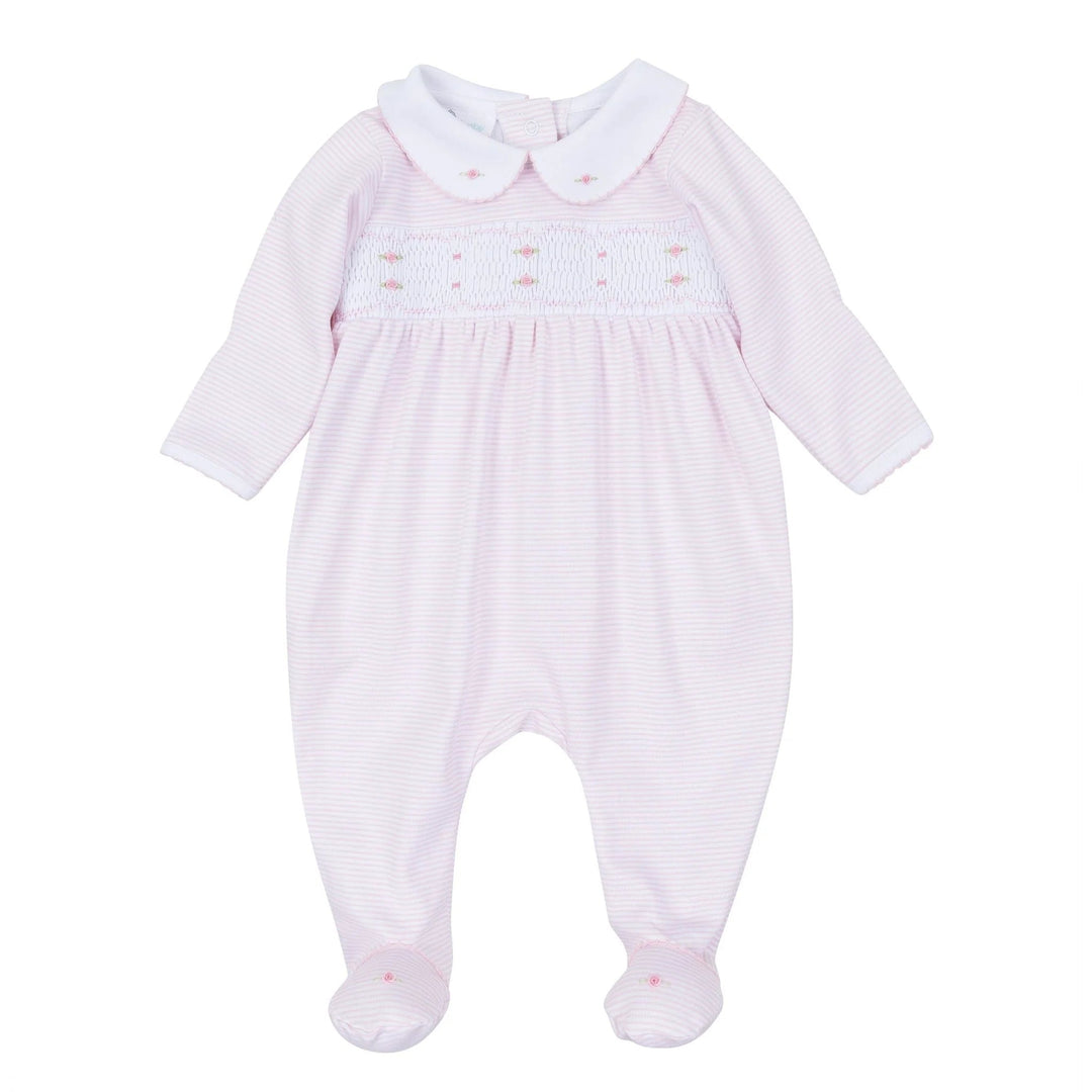 That Store pink micro-stripe baby footie in Pima cotton with hand-smocked chest, rosebud embroidery, and Peter Pan collar