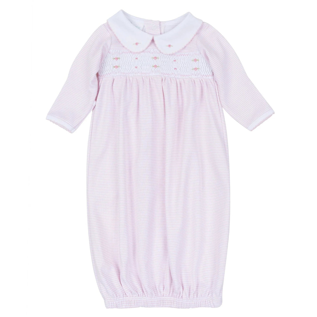 That Store Anna smocked gown in pink micro-stripe Pima cotton with a Peter Pan collar and embroidered rosebuds.