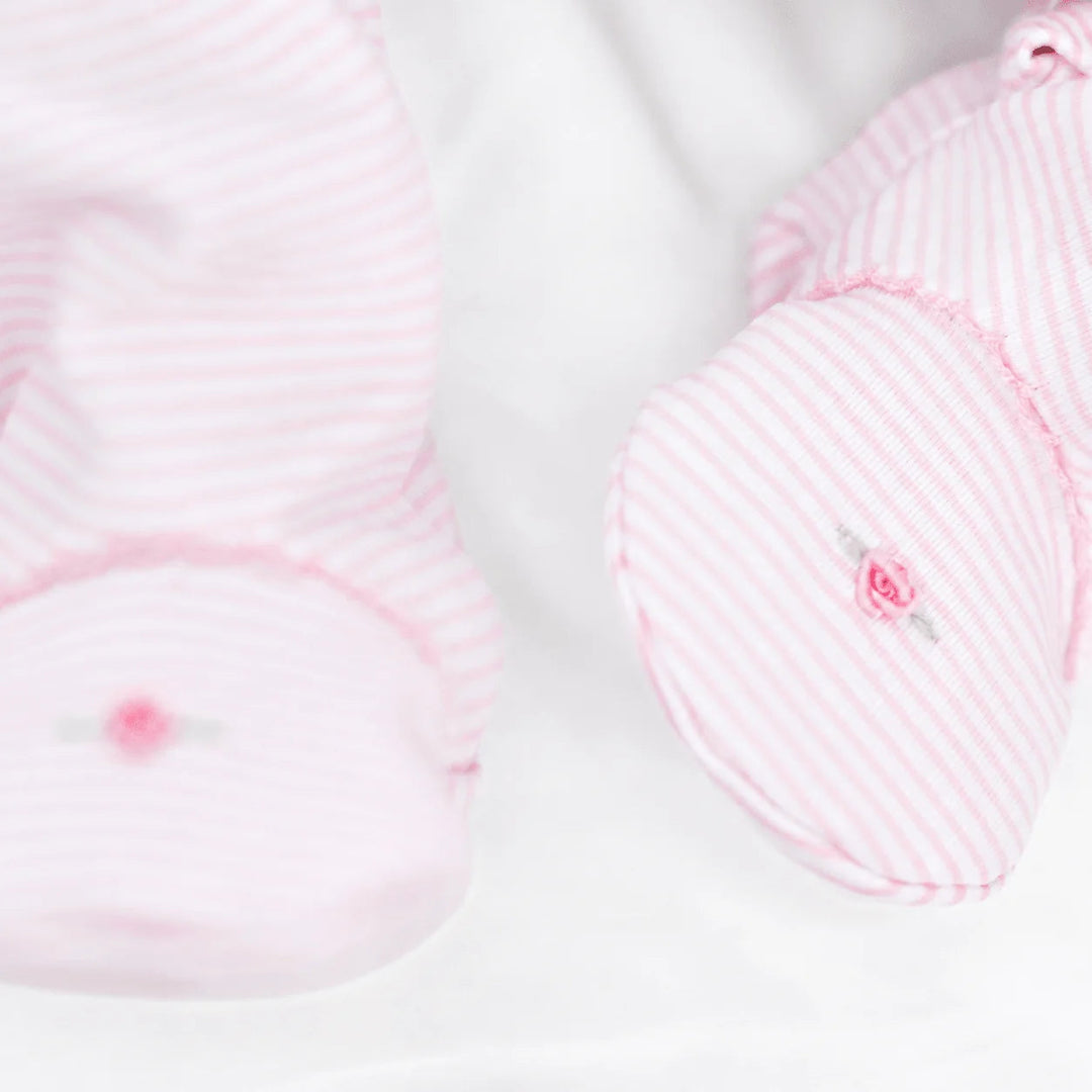 That Store pink micro-stripe baby footie in soft Peruvian Pima cotton with delicate embroidered rosebud detail