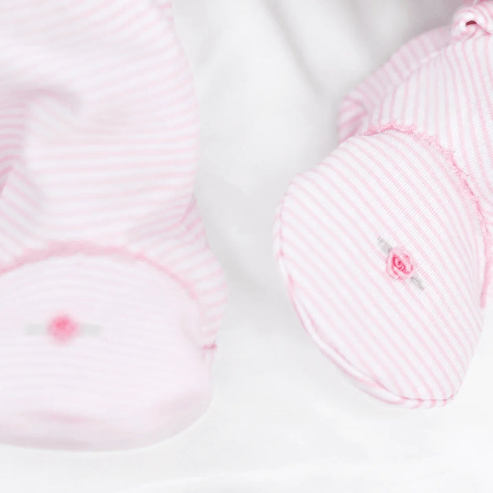 That Store pink micro-stripe baby footie in soft Peruvian Pima cotton with delicate embroidered rosebud detail