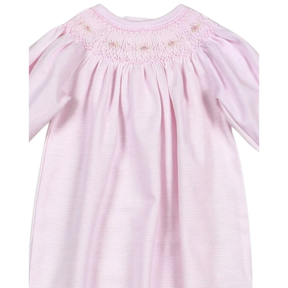 That Store baby girl gown in pink striped Pima cotton with hand smocked floral detailing and long sleeves.