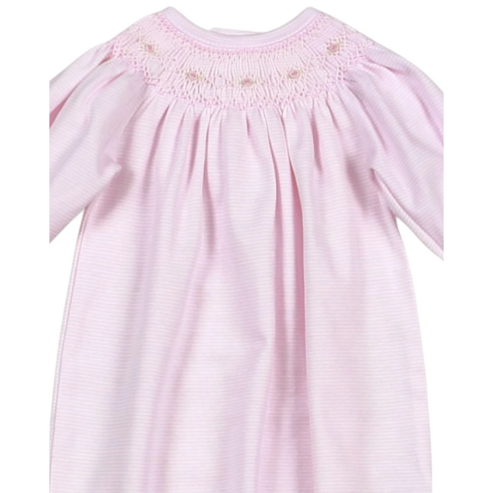 That Store baby girl gown in pink striped Pima cotton with hand smocked floral detailing and long sleeves.