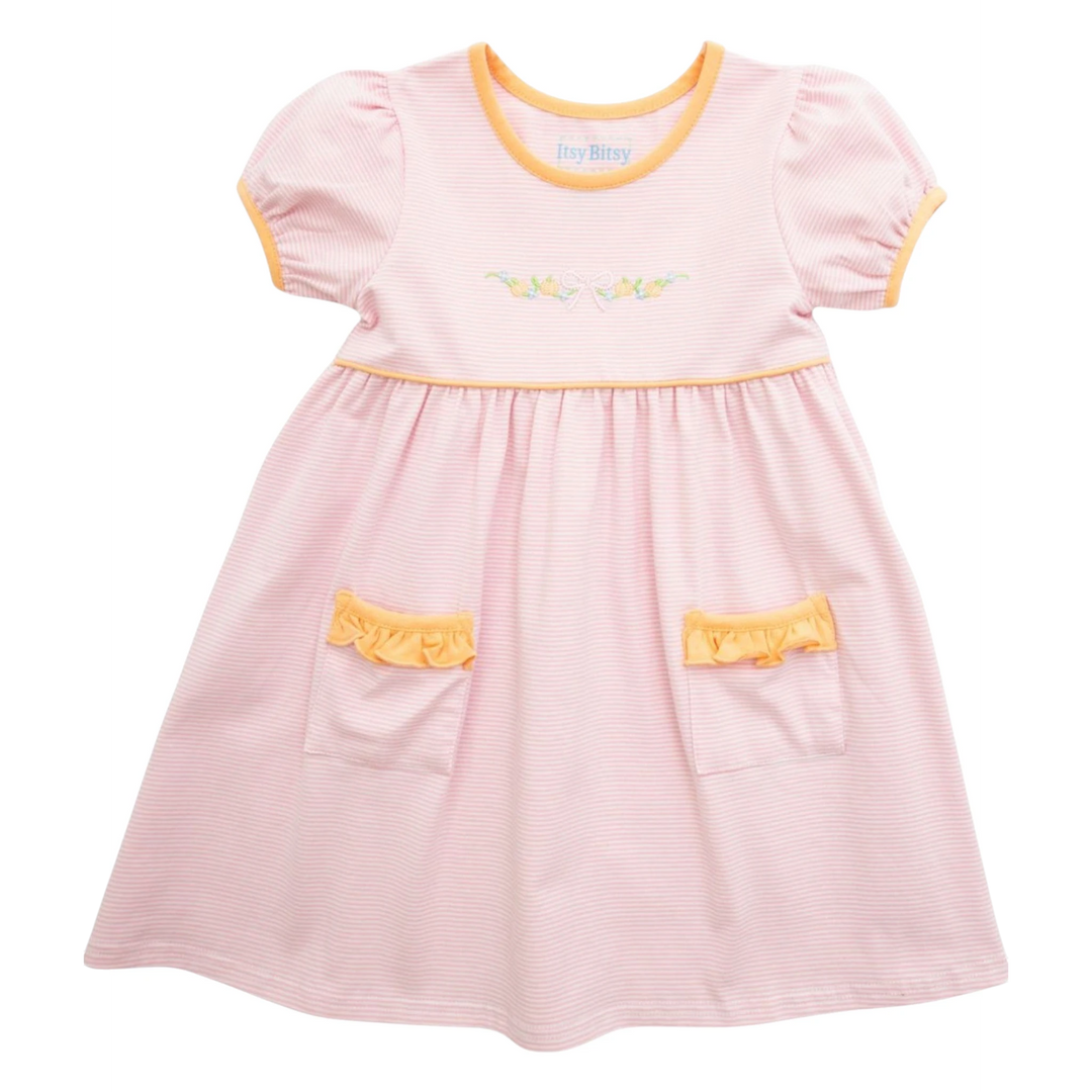 That Store pink striped dress with puff sleeves, pumpkin embroidery, and ruffled pockets for girls.