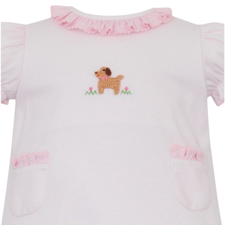 That Store pink striped cotton knit top with a crocheted puppy detail, ruffled collar, and two front pockets.