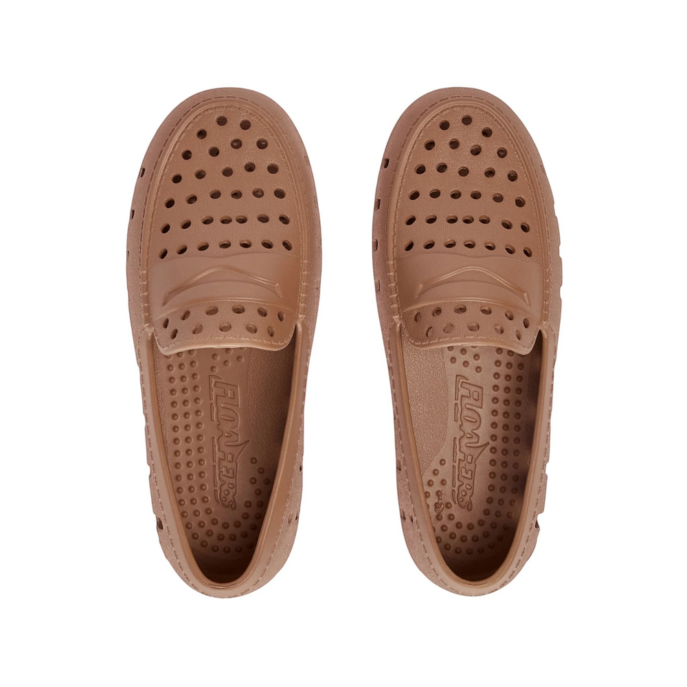 That Store Prodigy tan waterproof foam loafers for kids with breathable ventilation holes and rubber soles.