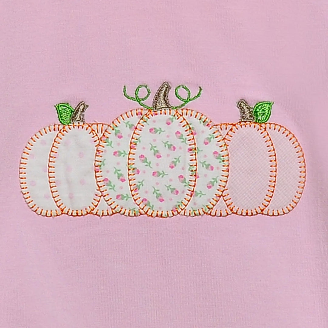 That Store pink cotton bubble featuring a festive pumpkin applique with floral and polka dot fabric patterns