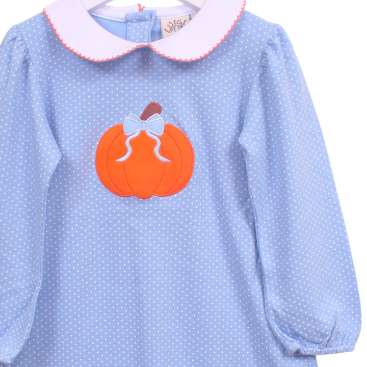 That Store blue polka dot cotton dress featuring a pumpkin appliqué with a bow and a white Peter Pan collar.