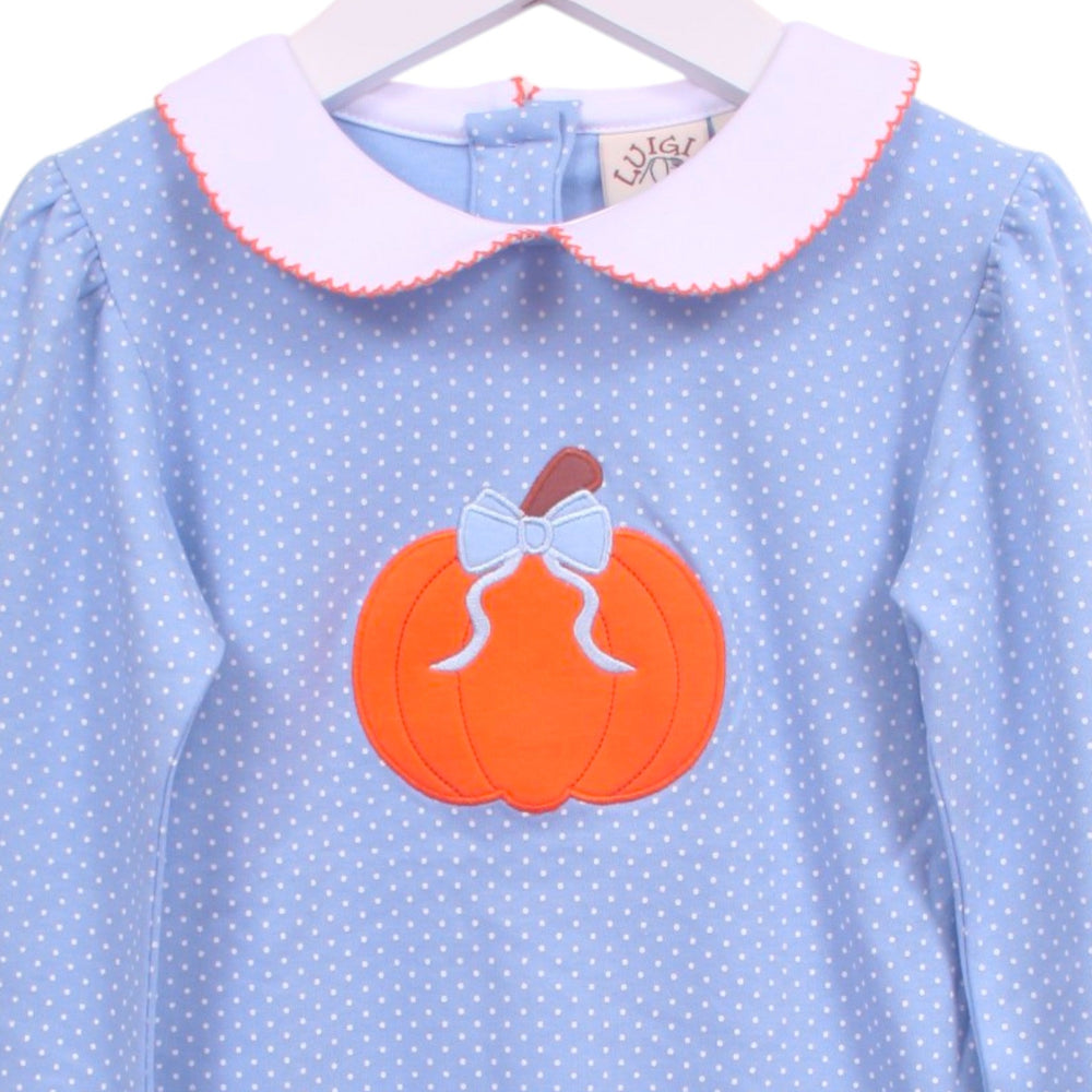 That Store blue polka dot cotton dress with a pumpkin and bow appliqué and a white Peter Pan collar.