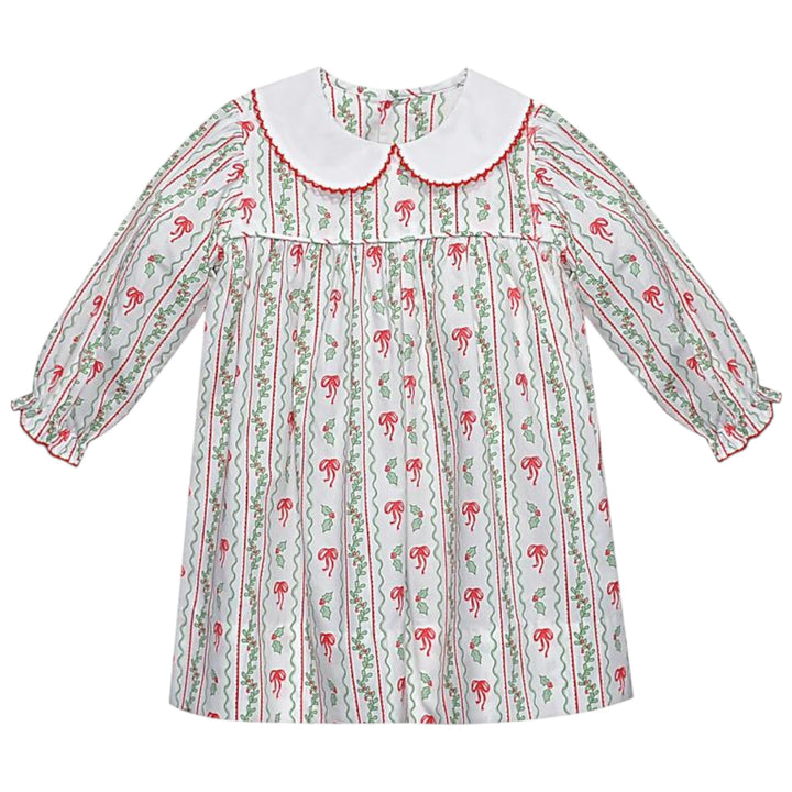 That Store girls Reagan dress in white cotton with red bows and green berries print and a white peter pan collar