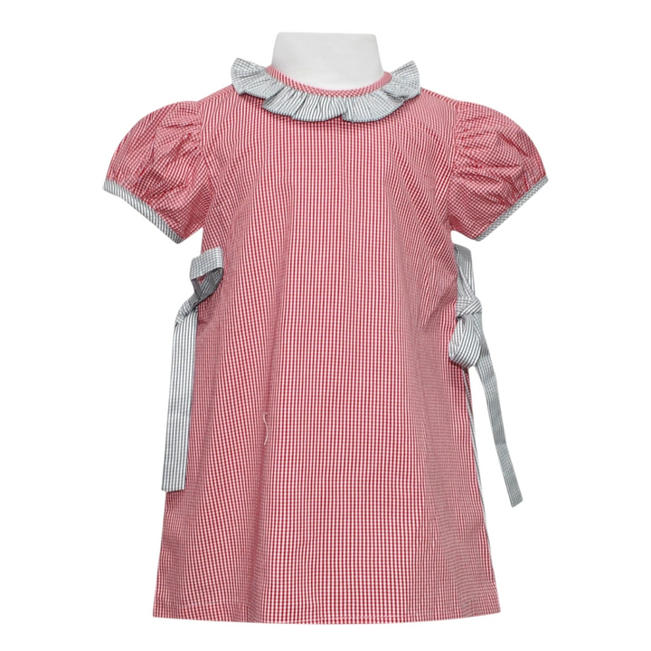 That Store red and black gingham dress with ruffled collar, puff sleeves, and side tie details in poly-cotton blend.