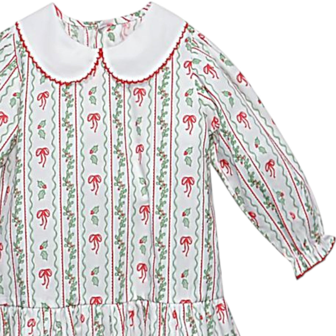That Store red Carrington dress in 100% cotton with a white Peter Pan collar and festive bows and berries print