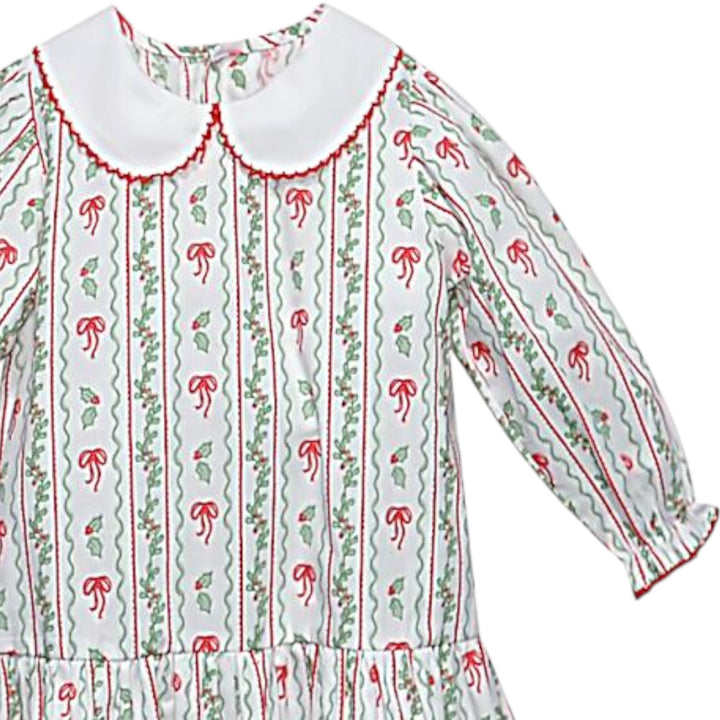 That Store red Carrington dress in 100% cotton with a white Peter Pan collar and festive bows and berries print