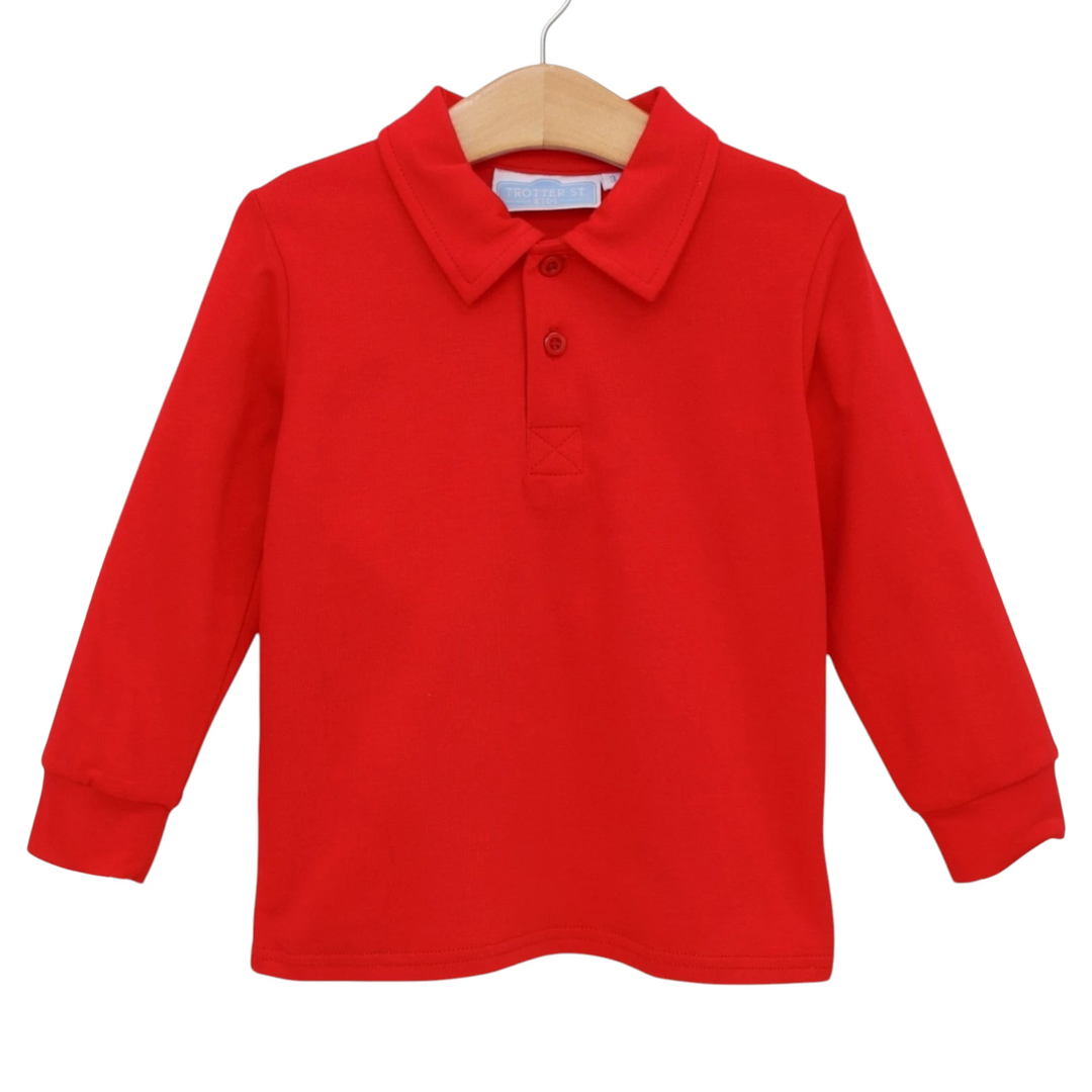 That Store Jackson boys long-sleeve polo shirt in classic red cotton blend with a button placket on a wooden hanger.