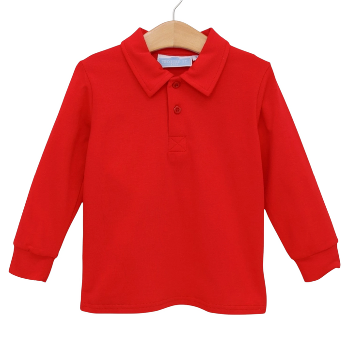 That Store Jackson boys long-sleeve polo shirt in classic red cotton blend with a button placket on a wooden hanger.