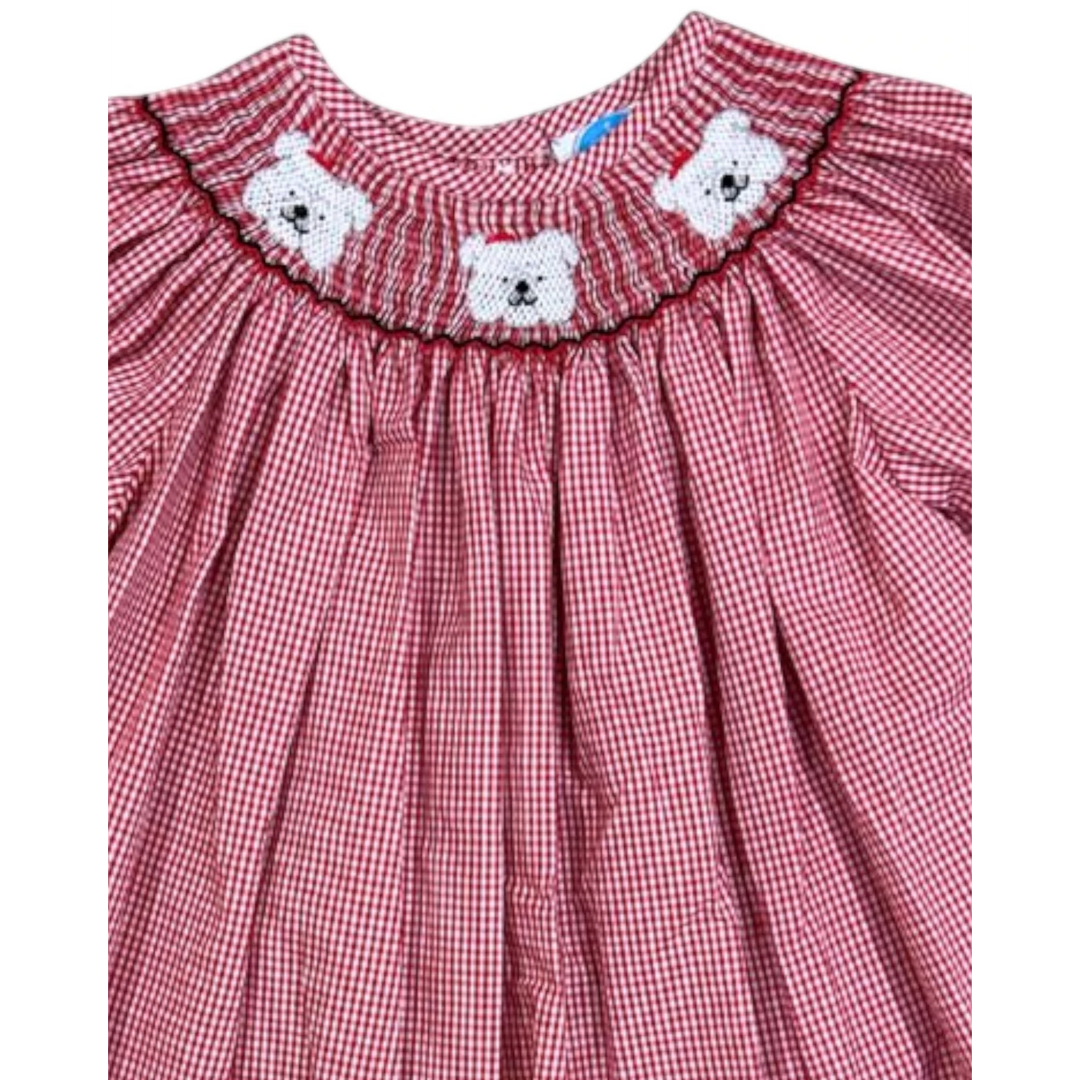 That Store red gingham bishop dress featuring hand-smocked white bulldog details with red accents on the neckline.