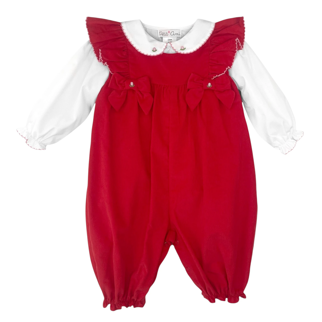 That Store red corduroy girls romper set with white long-sleeve shirt, ruffle shoulders, and decorative bows.