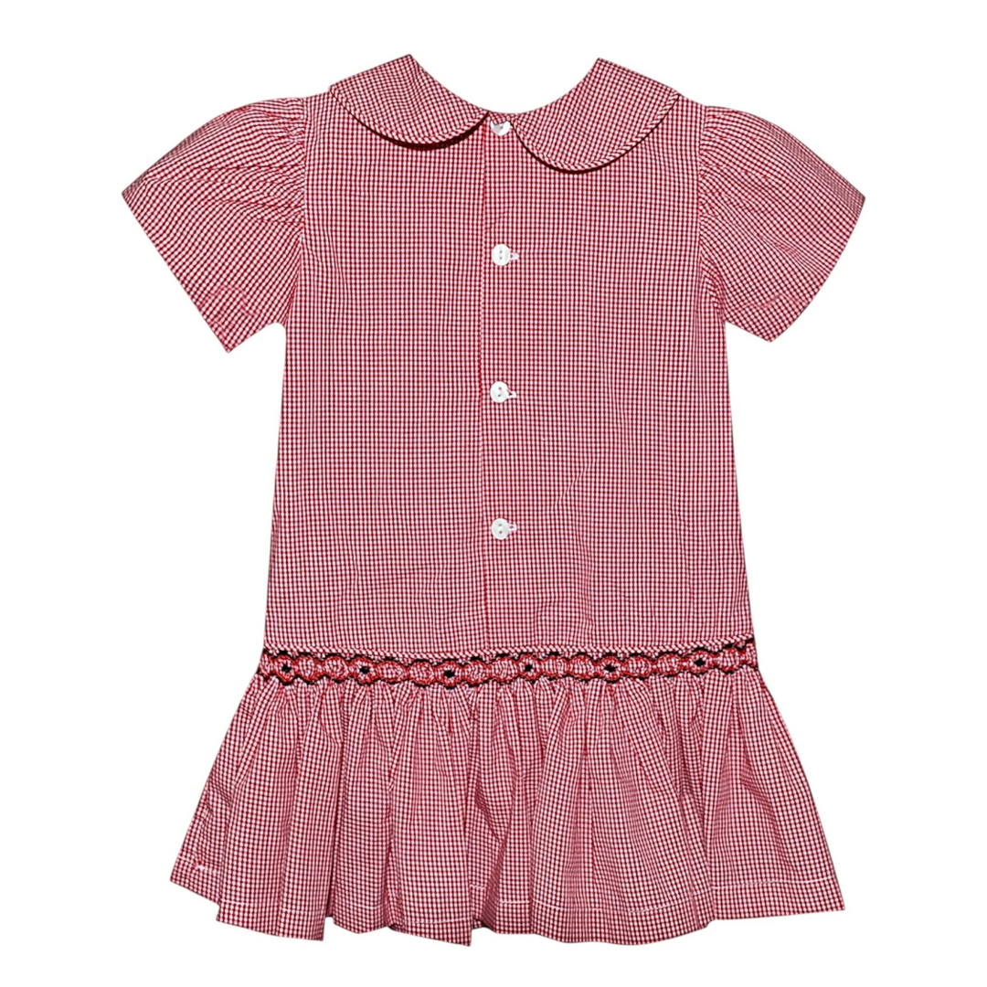 That Store red and white gingham drop waist dress by Southern Saturday with black and red geometric smocking detail.