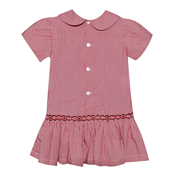 That Store red and white gingham drop waist dress by Southern Saturday with black and red geometric smocking detail.