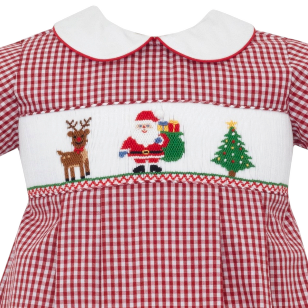 That Store boys bubble in red gingham featuring traditional smocking with a Santa, reindeer, and Christmas tree