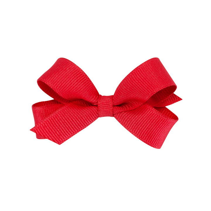 That Store red grosgrain hair bow with a WeeStay no-slip alligator clip, perfect for tiny hairstyles.