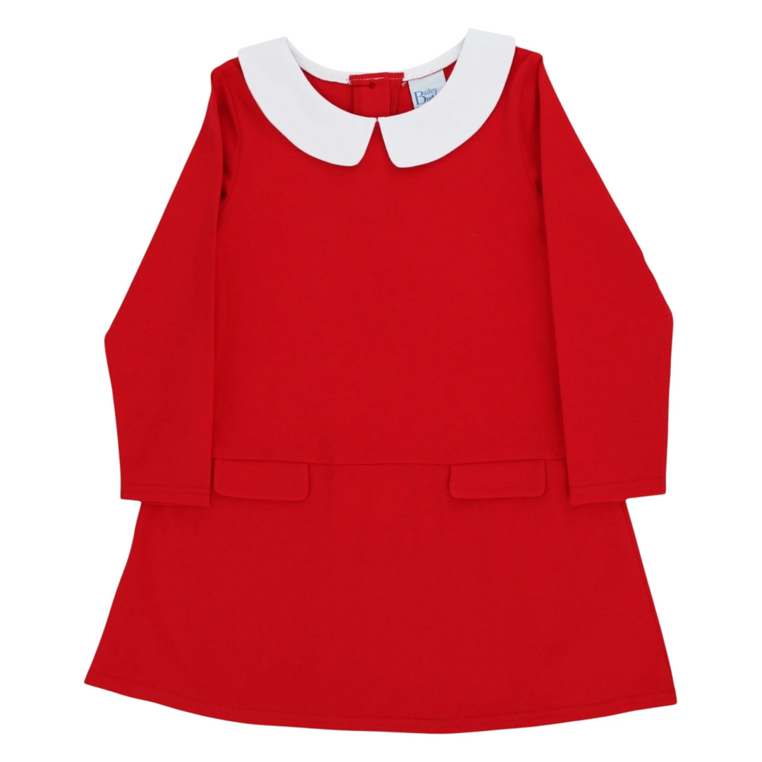 That Store girls red long sleeve knit dress with a white Peter Pan collar and front pockets in cotton blend fabric.
