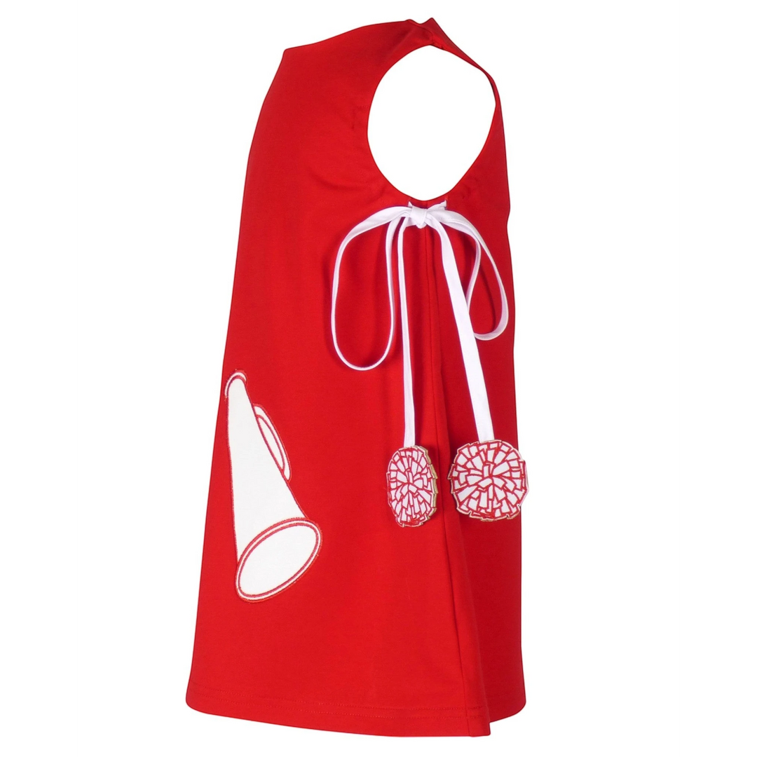 That Store red cotton jumper dress featuring a white megaphone applique and pom-pom trimmed side ties