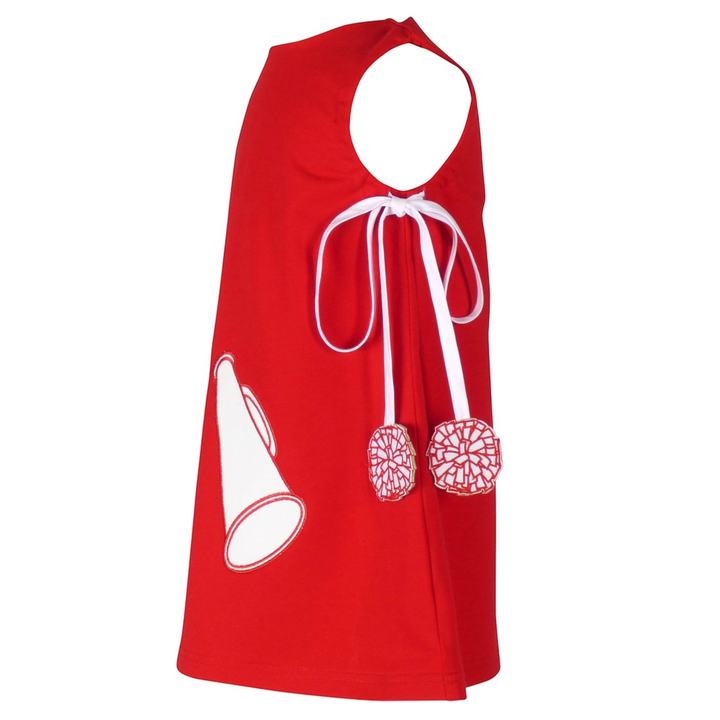That Store red cotton jumper dress featuring a white megaphone applique and pom-pom trimmed side ties