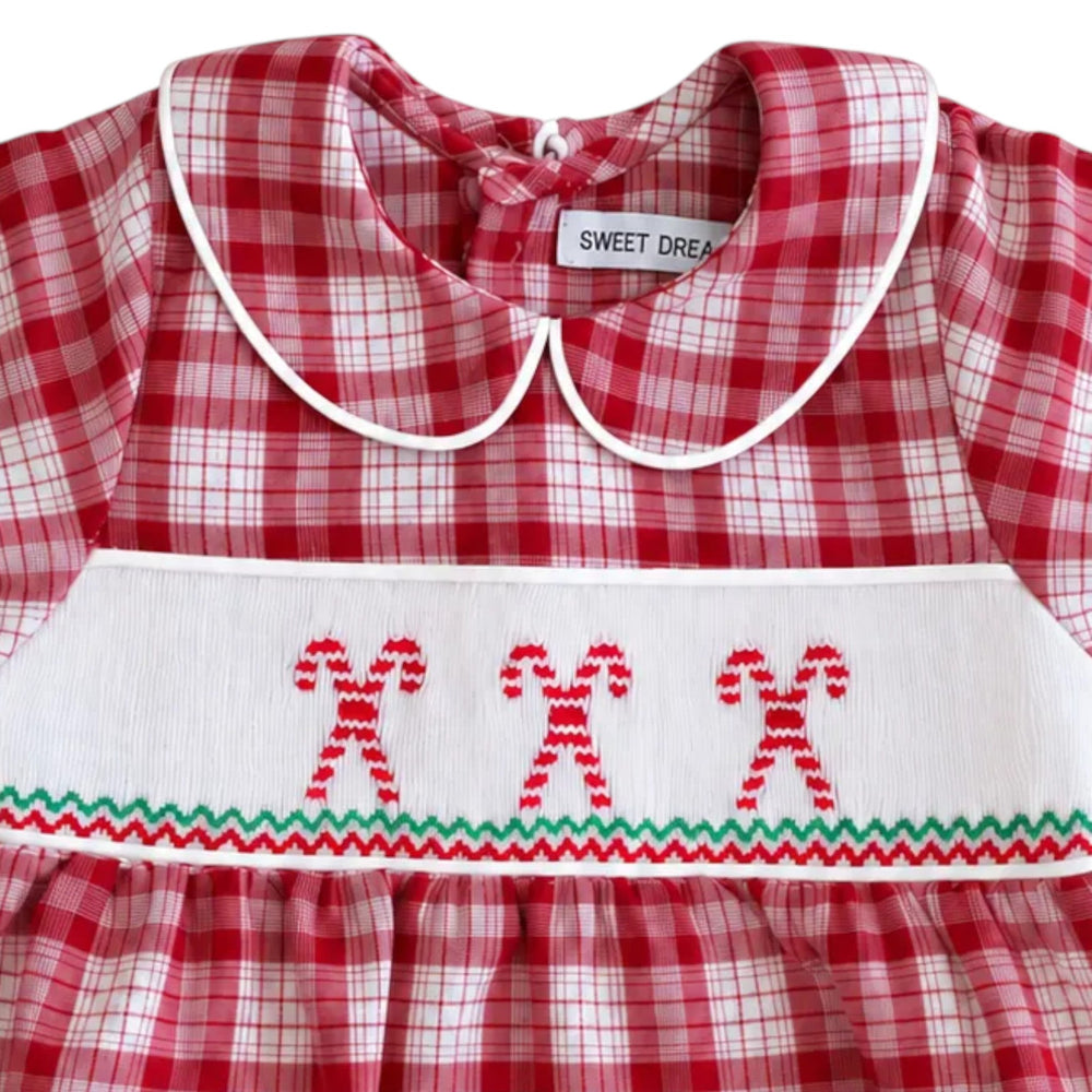 That Store boys red plaid bubble featuring white collar and festive candy cane smocking for Christmas holiday wear