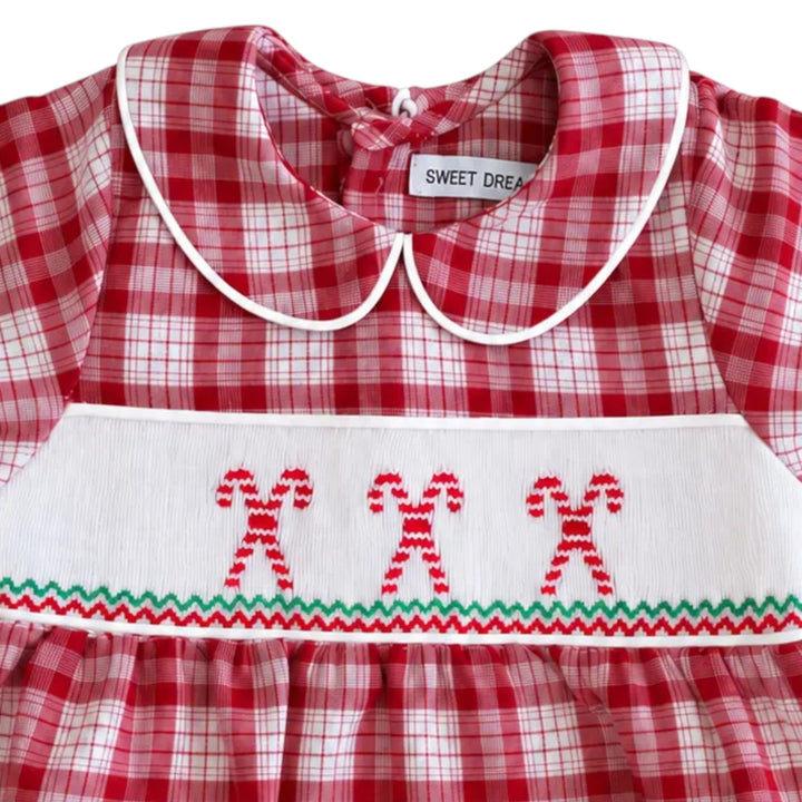 That Store boys red plaid bubble featuring white collar and festive candy cane smocking for Christmas holiday wear