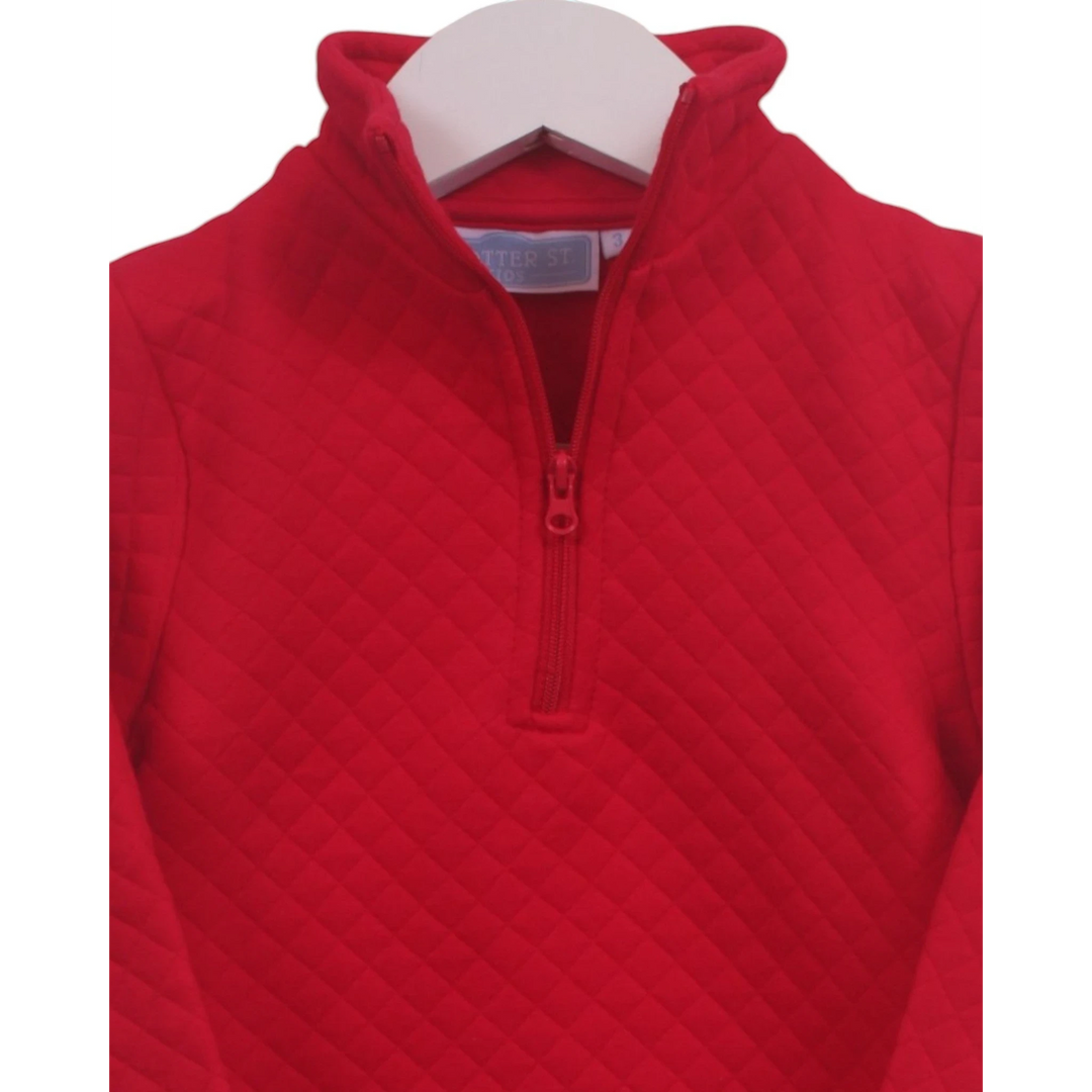 That Store red quilted 1/4 zip pullover for kids with a high collar and soft texture
