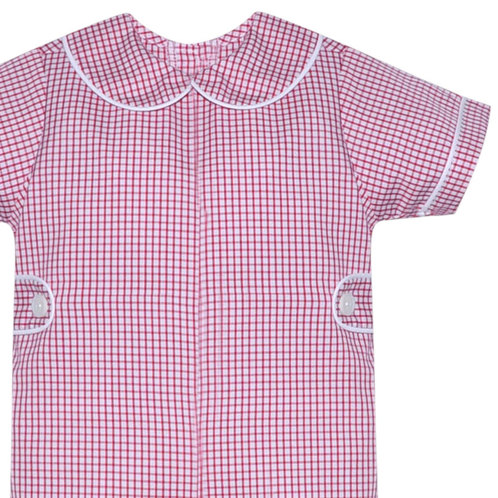 That Store red and white windowpane check baby romper with a Peter Pan collar and white piping detail.