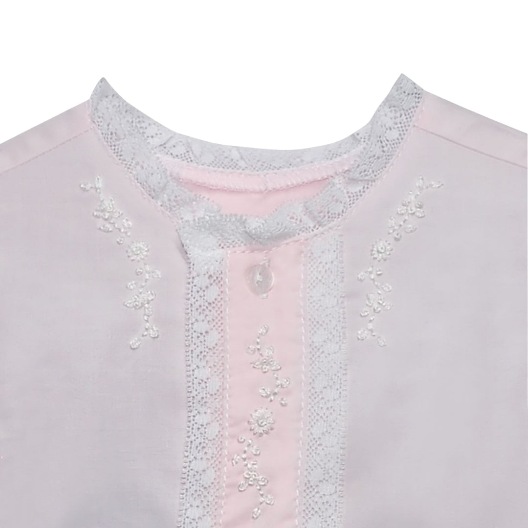 That Store Ridley blush pink baby daygown with white lace trim and delicate floral embroidery on the bodice
