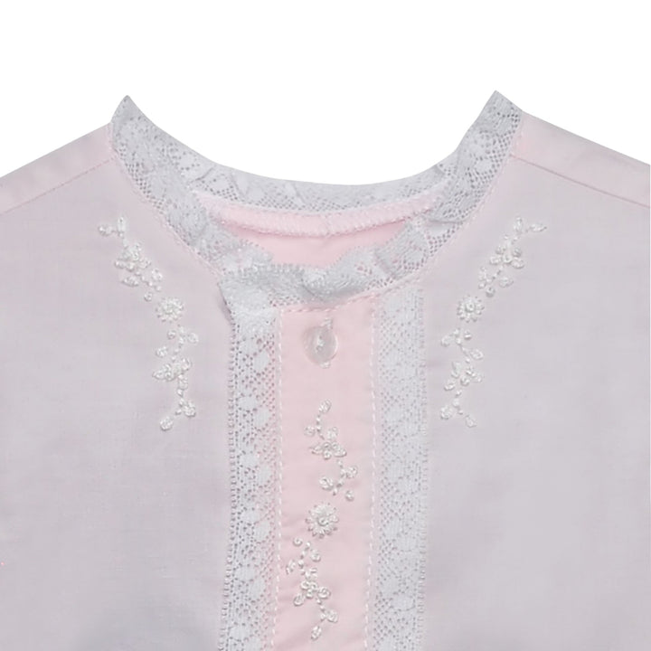 That Store Ridley blush pink baby daygown with white lace trim and delicate floral embroidery on the bodice