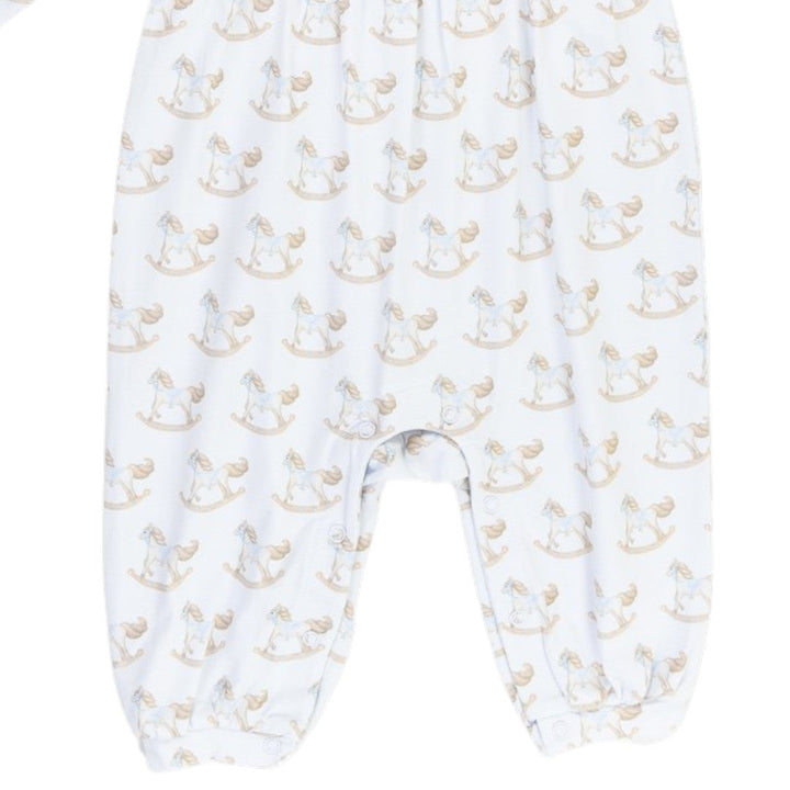 That Store boys playsuit in white with a nostalgic rocking horse print and soft blue trim, featuring snap closures.